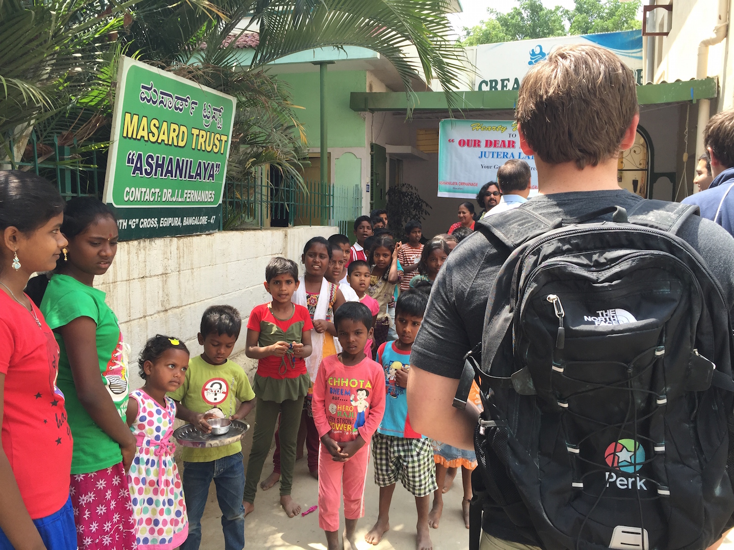 Orphanage entrance with all the kids